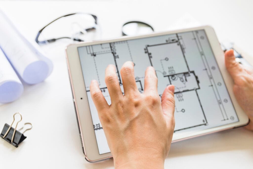 Architect reviewing house plans for energy code compliance - REScheck and COMcheck energy code report in Erving, MA