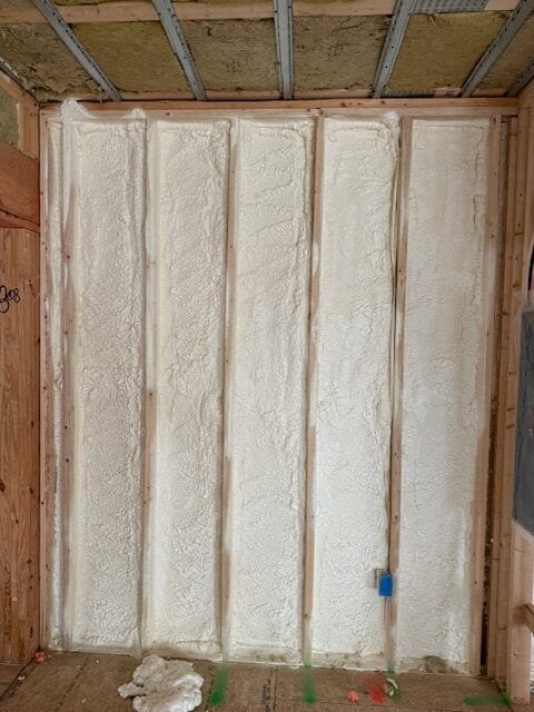 Closed-cell spray foam filling wall stud bays - HERS rating in Halifax, MA