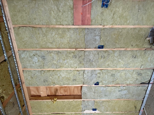 Mineral wool batt insulation installed in wall cavities in Erving, MA