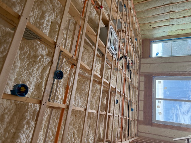 Spray foam ceiling insulation providing air sealing in Wellfleet, MA