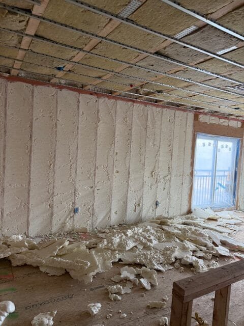Spray foam insulation on walls and ceiling of a new home - blower door testing in Middlefield, MA
