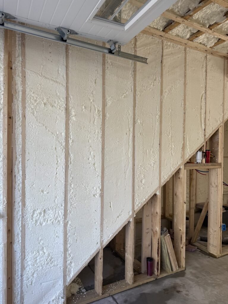 Foamed wall along a stair opening with open framing - HERS rating in Freetown, MA