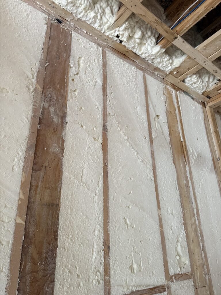 Spray foam filling exterior wall bays up to the top plate - HERS rating in Lynn, MA