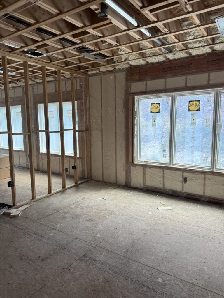 Spray-foamed exterior walls around new windows on an open floor - spray foam insulation in Marshfield, MA