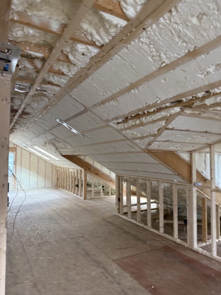 Long attic kneewall space with foamed roof slopes - HERS rating in Cheshire, MA