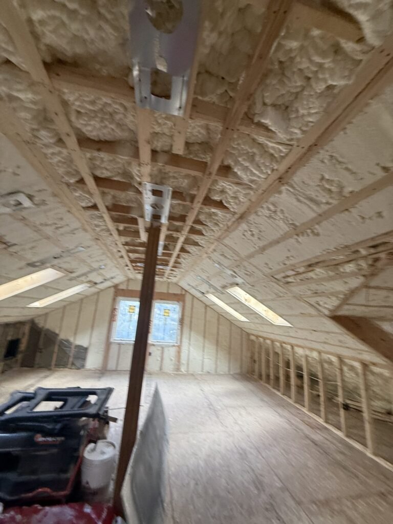 Attic living space with foamed rafters and skylights - HERS rating in Dedham, MA