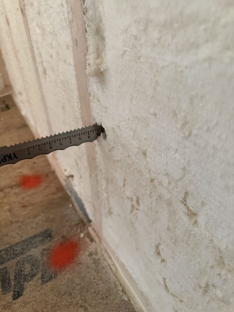 Close-up of a sprayed foam surface on a wall cavity - HERS rating in Danvers, MA