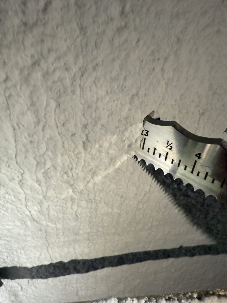 Measuring spray foam depth on a finished wall surface - spray foam insulation in Oakham, MA