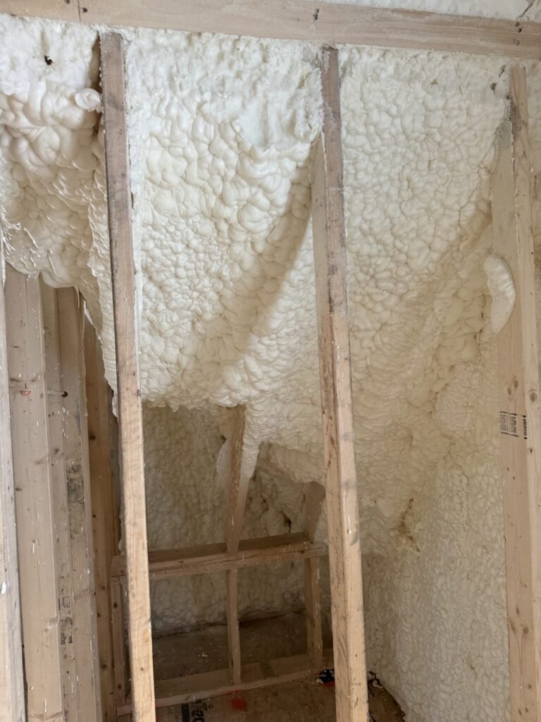 Open-cell spray foam filling a deep wall cavity - spray foam insulation in Florida, MA