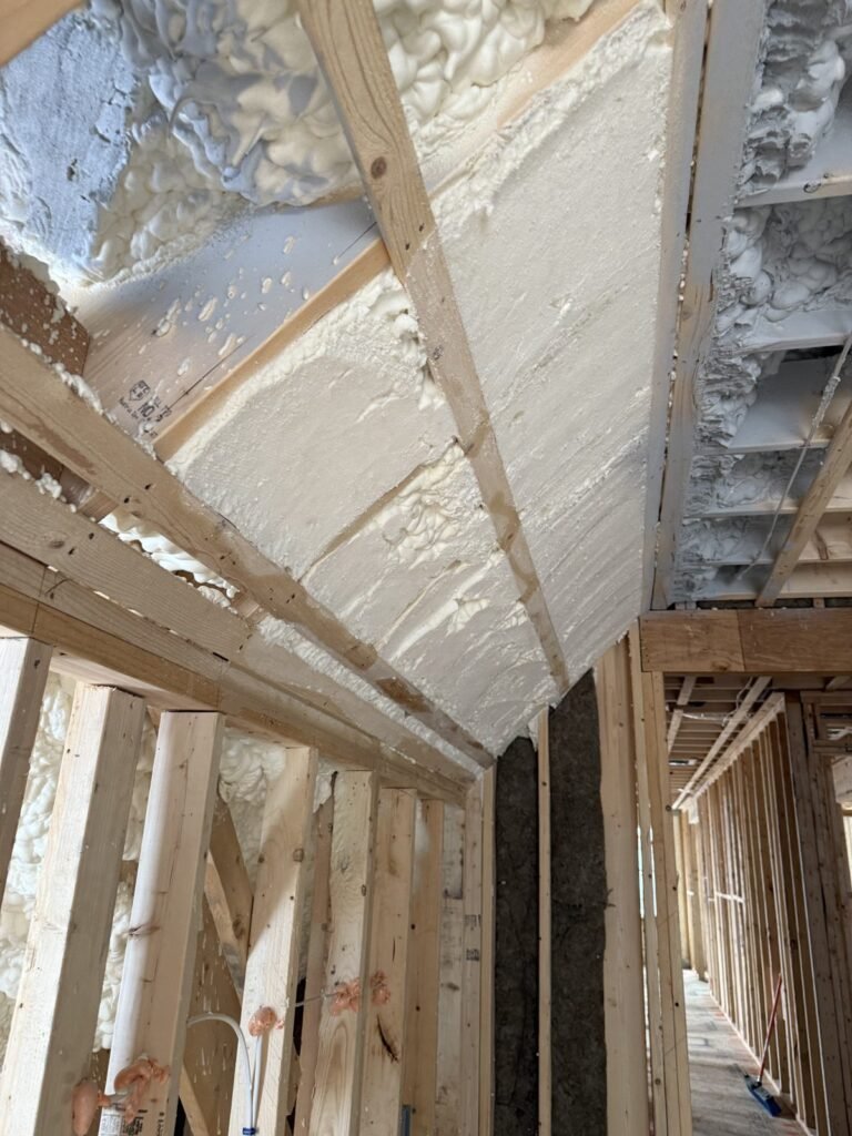 Foamed cathedral ceiling rafters seen from below - HERS rating in Dedham, MA