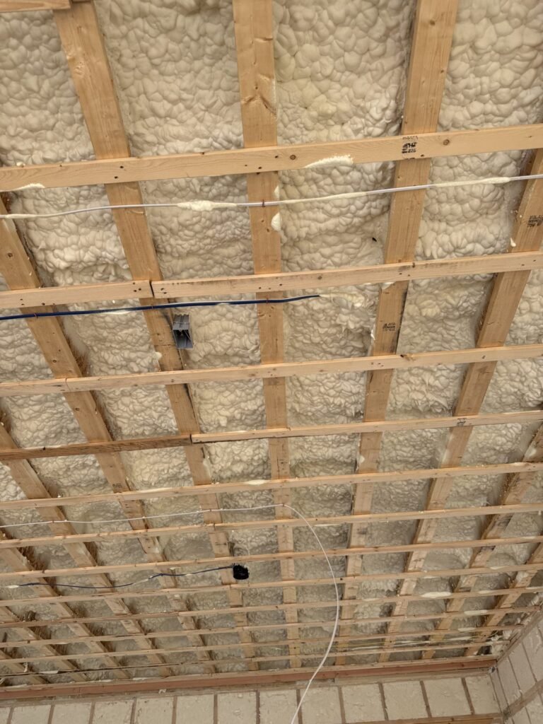 Grid of ceiling strapping over a foamed roof deck - HERS rating in Essex, MA