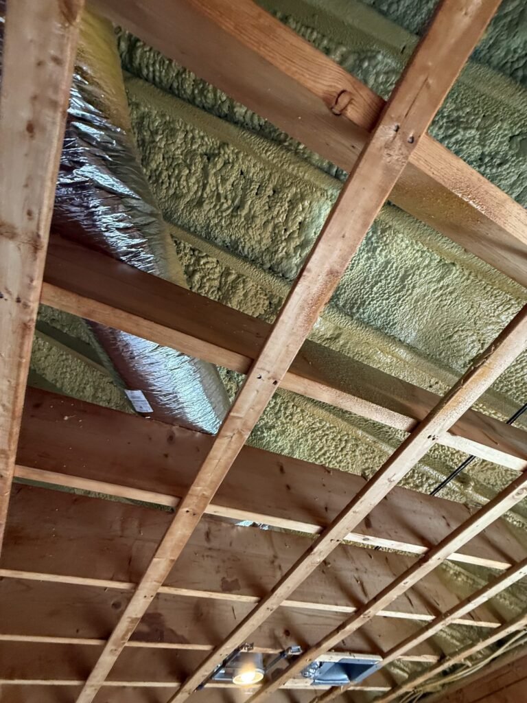 Ceiling strapping beneath rafter bays with mixed foam insulation - HERS rating in Florida, MA