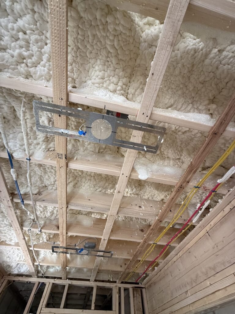 Foamed ceiling with an electrical box mounted on strapping - HERS rating in Acton, MA