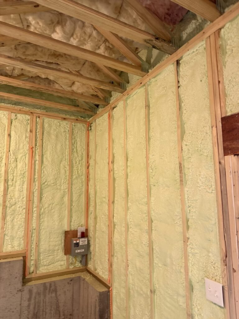 Spray foam on lower-level walls above the foundation with a corner panel box - HERS rating in Attleboro, MA