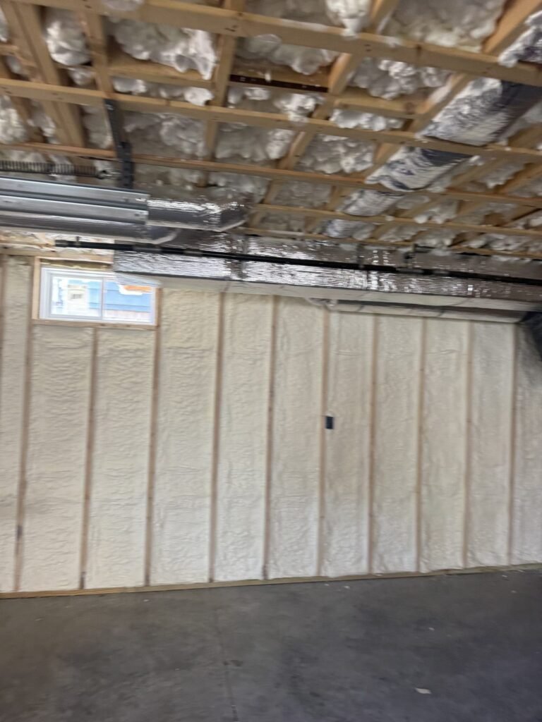 Spray foam on garage walls under the ceiling joists - spray foam insulation in Halifax, MA
