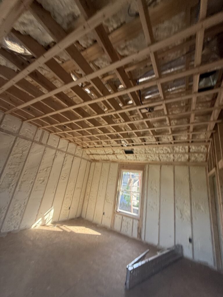 Second-floor room with spray foam on every wall and ceiling bay - HERS rating in Lawrence, MA
