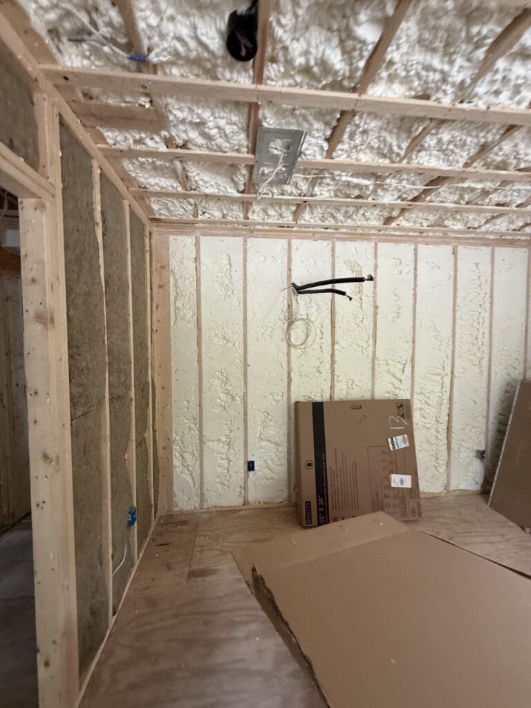 Spray foam walls and ceiling in a narrow room ready for drywall - spray foam insulation in Lawrence, MA