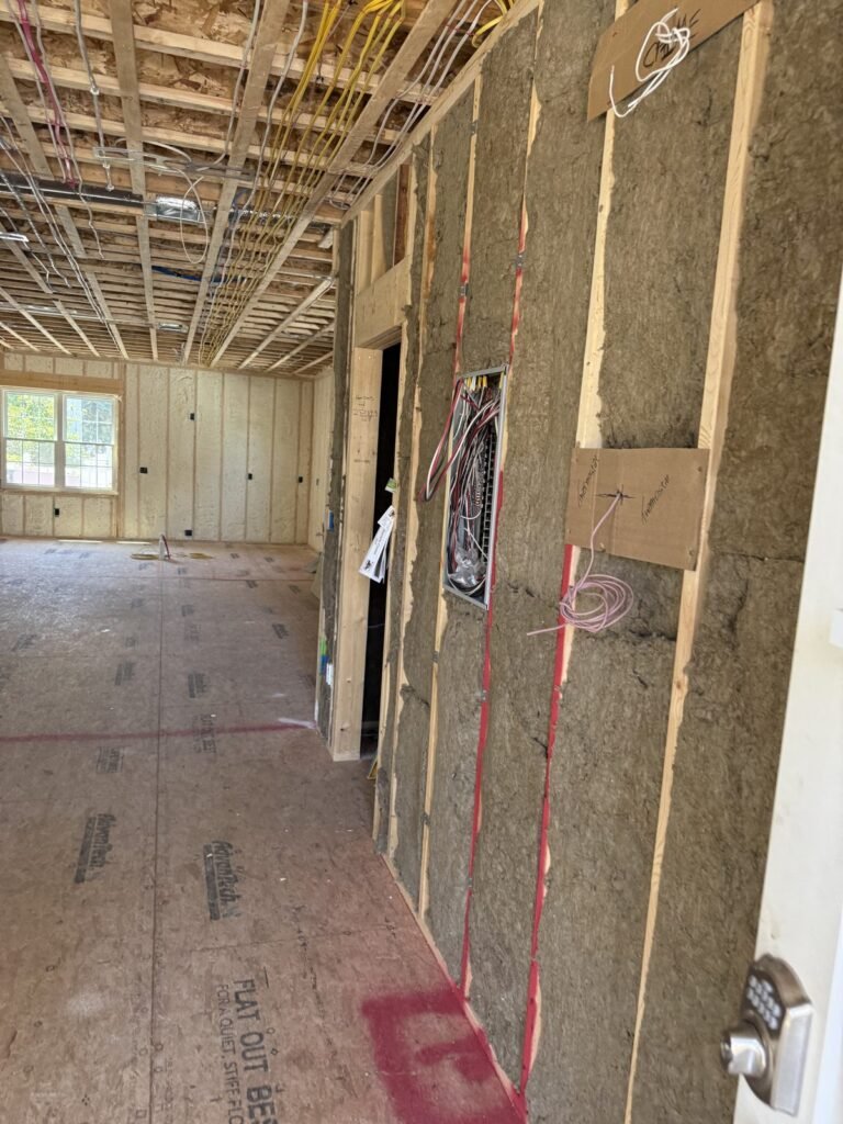 Spray-foamed exterior walls beyond interior partitions with sound batts - spray foam insulation in Halifax, MA