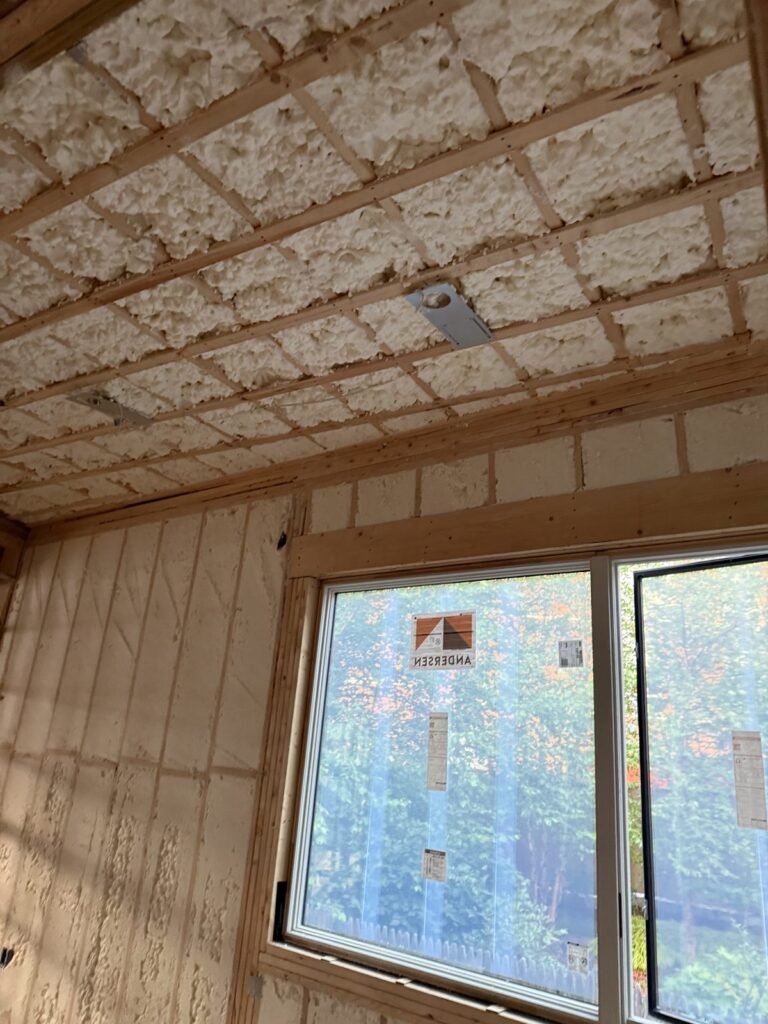 Spray foam ceiling and walls around a sliding door - spray foam insulation in Natick, MA