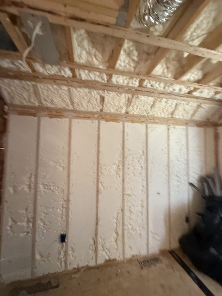 Spray foam wall and ceiling with ductwork above - spray foam insulation in Beverly, MA