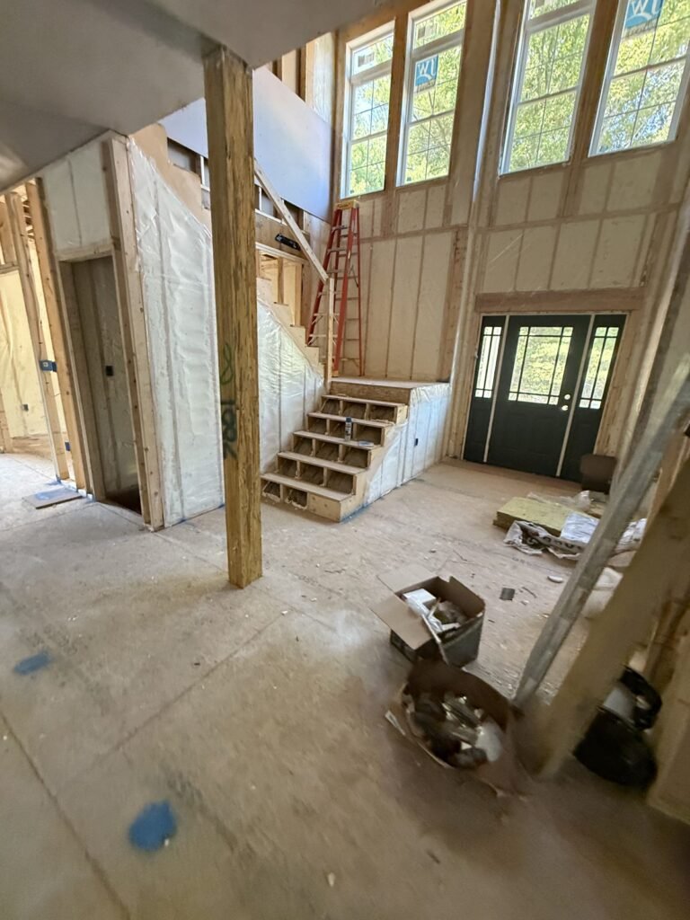 Spray-foamed open room with framed stairs and French doors - HERS rating in Agawam, MA