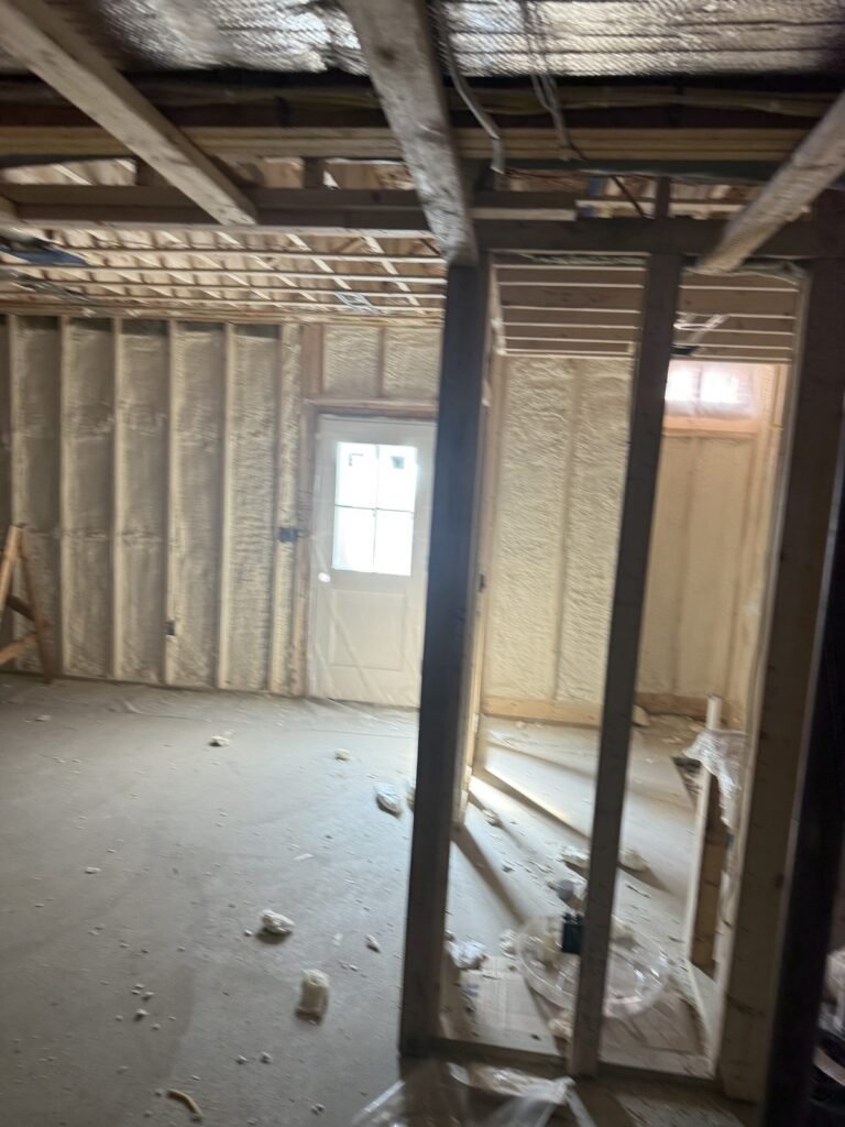 Spray foam walls in a basement room with new framing - spray foam insulation in Warren, MA