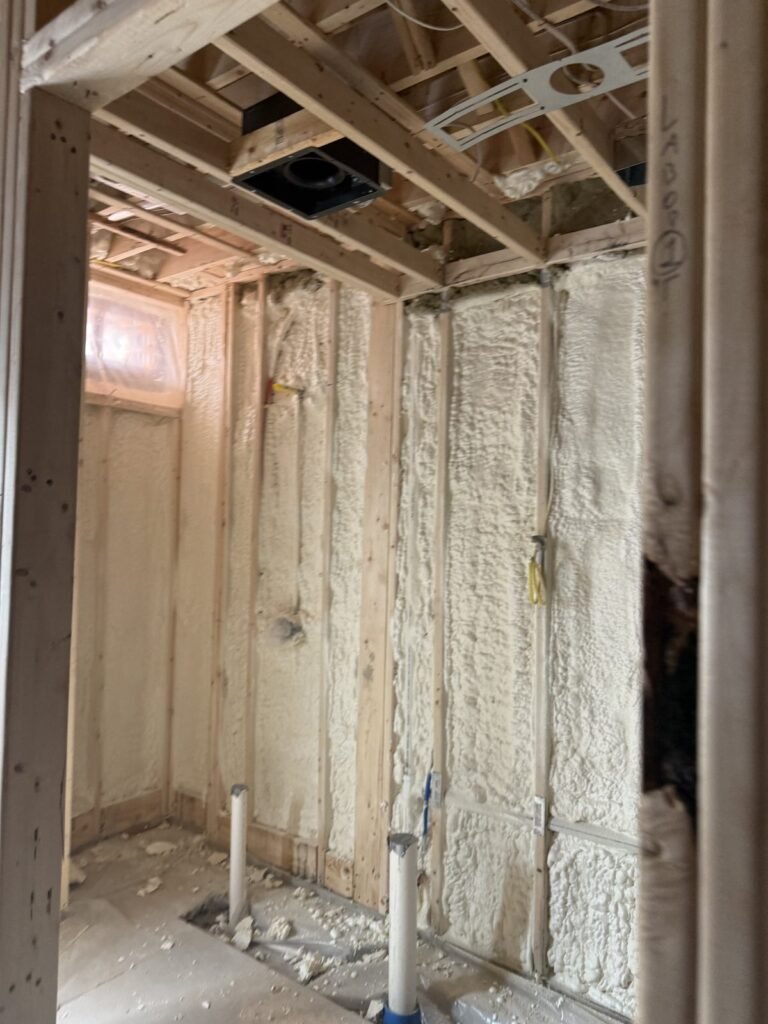 Deep foam-filled wall cavities in an interior corner - HERS rating in Norfolk, MA